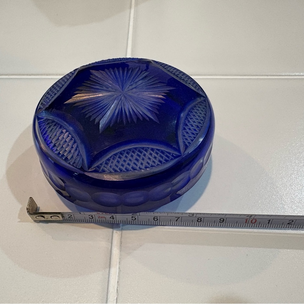 Starburst blue glass trinket box with decorative clear glass lid